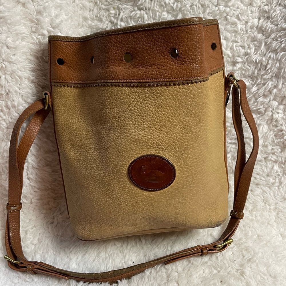 Dooney & Bourke leather khaki & brown Bucket bag Brass hardwares .
